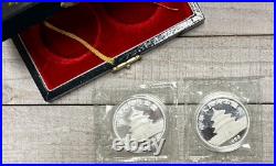 1989 Two-Coin Set 10 Yuan Silver Chinese Panda Coins in original packaging & COA