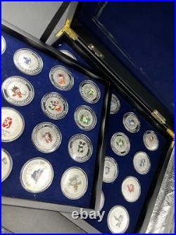 44 2008 Beijing Olympics Coin Set with 42 1 Oz. 999 Silver Coins & 2 Silver Medals