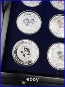 44 2008 Beijing Olympics Coin Set with 42 1 Oz. 999 Silver Coins & 2 Silver Medals
