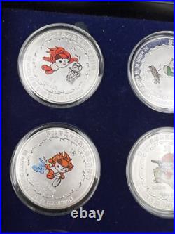 44 2008 Beijing Olympics Coin Set with 42 1 Oz. 999 Silver Coins & 2 Silver Medals
