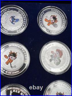 44 2008 Beijing Olympics Coin Set with 42 1 Oz. 999 Silver Coins & 2 Silver Medals