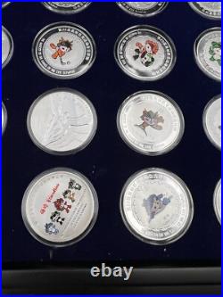 44 2008 Beijing Olympics Coin Set with 42 1 Oz. 999 Silver Coins & 2 Silver Medals