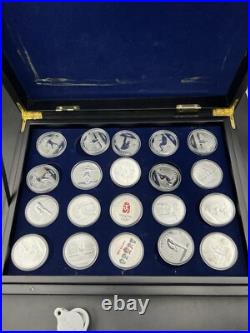 44 2008 Beijing Olympics Coin Set with 42 1 Oz. 999 Silver Coins & 2 Silver Medals