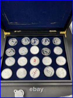 44 2008 Beijing Olympics Coin Set with 42 1 Oz. 999 Silver Coins & 2 Silver Medals