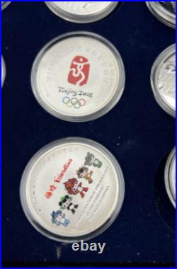 44 2008 Beijing Olympics Coin Set with 42 1 Oz. 999 Silver Coins & 2 Silver Medals