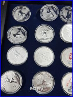 44 2008 Beijing Olympics Coin Set with 42 1 Oz. 999 Silver Coins & 2 Silver Medals