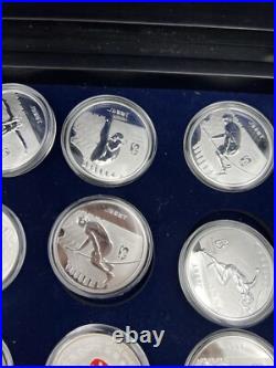 44 2008 Beijing Olympics Coin Set with 42 1 Oz. 999 Silver Coins & 2 Silver Medals