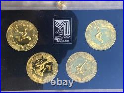 China set of 4 coins Lake Placid Winter Olympic Games bronze coins 1980