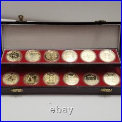 Vintage Asian Zodiac Coin Collection Gold Tone Medallions Complete Set with Box