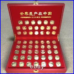 World Heritage Coins Set of 55 miniature commemorative emblems in box Used